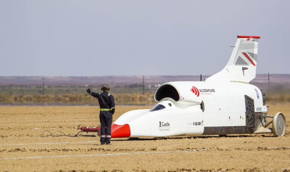 In this handout photo provided by Bloodhound, the vehicle is set for a trail run along the Hakskeenpan track in South Africa during trials to set a land speed record Friday, Nov. 8, 2019. Hitting 501 miles per hour on the South Africa’s northern desert, the Bloodhound became one of the world’s 10 fastest cars this week, on target for its goal to set a new land speed record. A jet that stays on earth, Bloodhound’s next goal is to reach 550 miles per hour, possibly in the coming week. (Charlie Sperring/Bloodhound via AP)