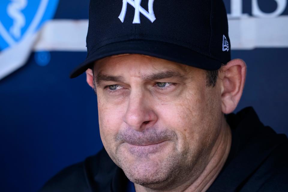 New York Yankees manager Aaron Boone answers questions from the media during warmups before a game against the Kansas City Royals, Sunday, Oct. 1, 2023, in Kansas City, Mo. (AP Photo/Reed Hoffmann)
