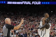 San Diego State guard Lamont Butler celebrates after scoring the game winning basket with forward Aguek Arop, right, during the second half of a Final Four college basketball game against Florida Atlantic in the NCAA Tournament on Saturday, April 1, 2023, in Houston. (AP Photo/David J. Phillip)