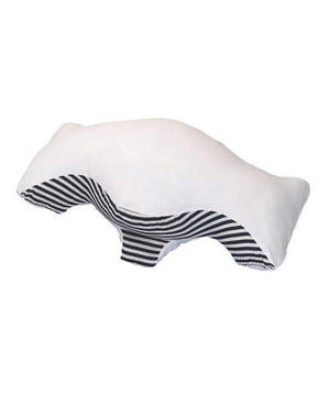 <div class="caption-credit"> Photo by: amazon.com</div><div class="caption-title">Positional-Therapy Pillows</div><b>Why they work:</b> Fifty-four percent of snorers do so only when on their backs-a position that can cause the tongue and soft palate to collapse back into the throat, blocking the airway and making the tissues vibrate, says Nancy Collop, M.D., the director of the Emory Sleep Center, in Atlanta. These pillows are designed with a groove that cradles your head so you can lie comfortably on your side. Try the Sona pillow (shown here; $50, sonapillow.com). <br> <br> <b>Good to know:</b> A DIY trick that encourages side sleeping: Drop a tennis ball into a sock and pin it to the back of the snorer's pajamas. <br> <br> <b>More on RealSimple.com: <a rel="nofollow noopener" href="http://www.realsimple.com/health/preventative-health/sleep/get-good-nights-sleep-10000001098117/index.html?xid=yshi-rs-sleep-042413" target="_blank" data-ylk="slk:Get a Good Night's Sleep;elm:context_link;itc:0;sec:content-canvas" class="link ">Get a Good Night's Sleep</a></b> <br>