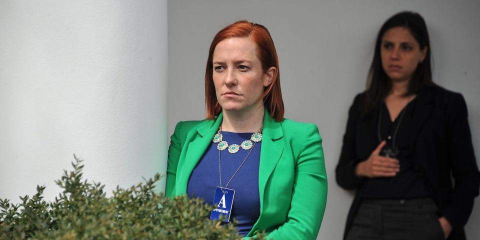 White House Communications Director Jen Psaki listens to US President Barack Obama makes a statement at the White House in Washington, DC, on April 2, 2015 after a deal was reached on Iran's nuclear program.