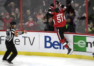 Ottawa Senators center Artem Anisimov (51) jumps against the boards after scoring against the Dallas Stars in overtime during the third period of an NHL hockey game Sunday, Feb. 16, 2020, in Ottawa, Ontario. (Justin Tang/The Canadian Press via AP)