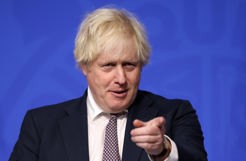 Prime Minister Boris Johnson said the military would help the NHS deliver booster jabs (Hollie Adams/PA) (PA Wire)