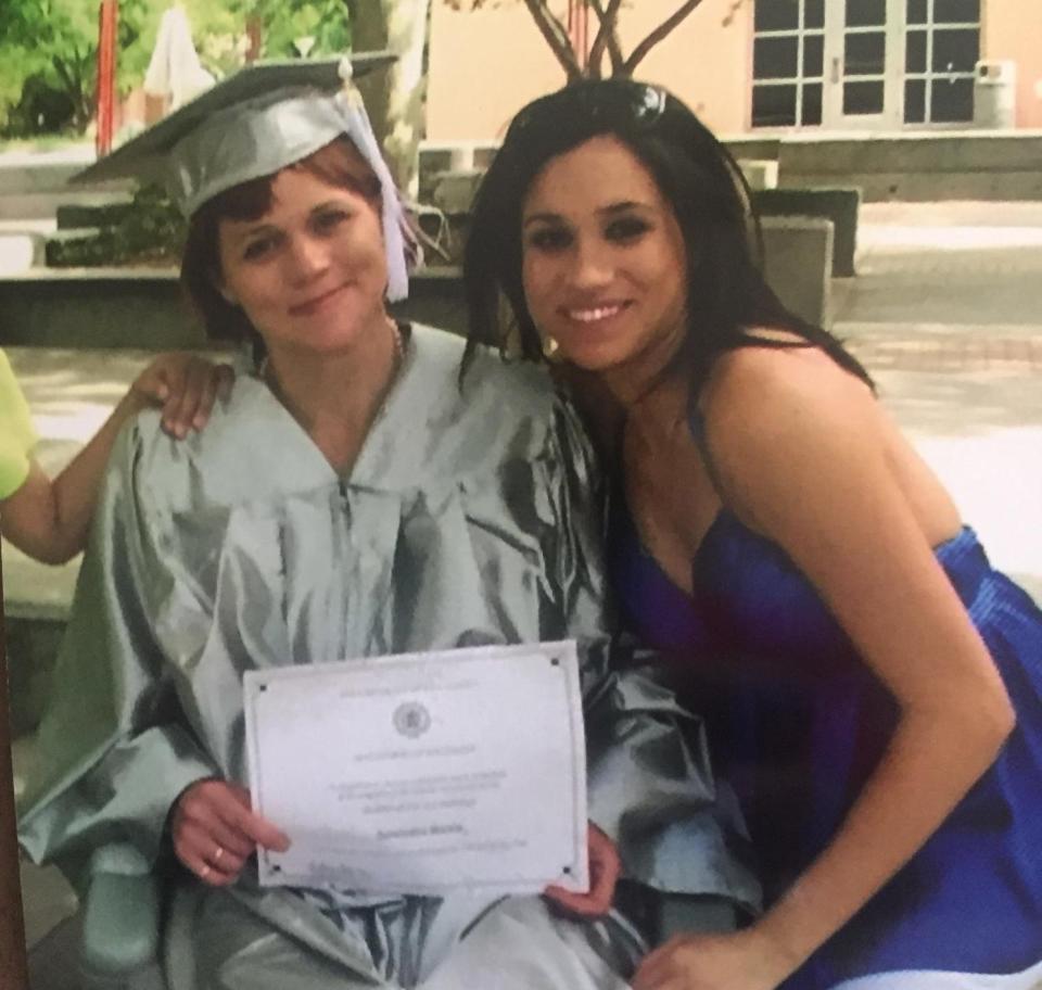 Samantha Markle, left, is shown in 2008 when she graduated from college with a bachelor's degree in criminology. Her half-sister, Meghan Markle, is shown posing with her for the picture. [Submitted]