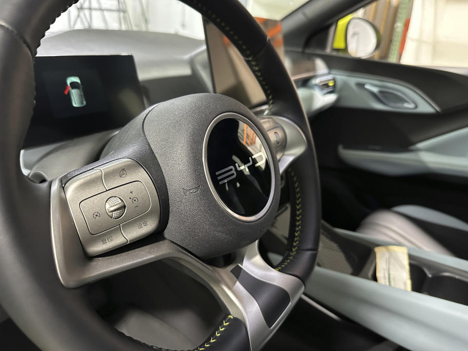 The steering wheel of a BYD Seagull electric vehicle as seen at the Caresoft Global facility Wednesday, April 3, 2024, in Livonia, Mich. Caresoft President Terry Woychowski, a former engineer at General Motors, said the Seagull represents a "clarion call" for the U.S. auto industry. (AP Photo/Mike Householder)