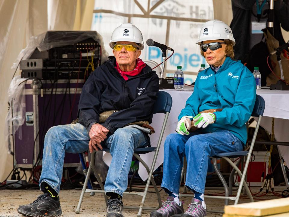 Jimmy and Rosalynn Carter take a break at the Jimmy and Rosalynn Carter Work Project for Habitat for Humanity Edmonton in 2017.