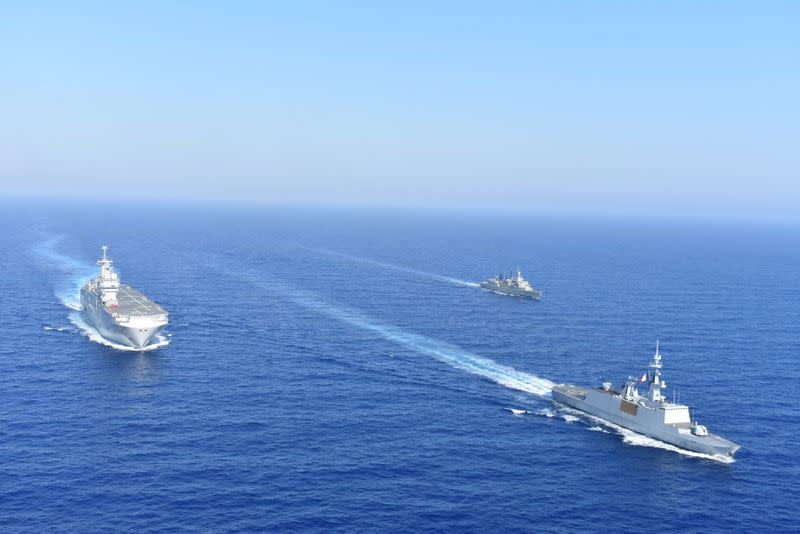 FILE PHOTO: Greek and French vessels sail in formation during a joint military exercise in Mediterranean sea