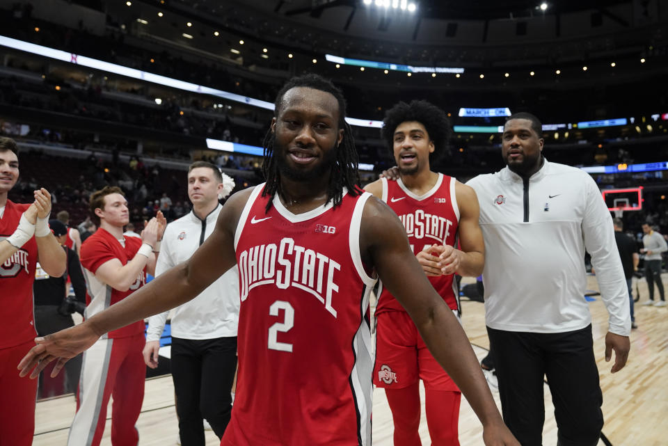 Ohio State's Bruce Thornton (2) and his teammates celebrate after an NCAA college basketball game at the Big Ten men's tournament, Friday, March 10, 2023, in Chicago. (AP Photo/Erin Hooley)