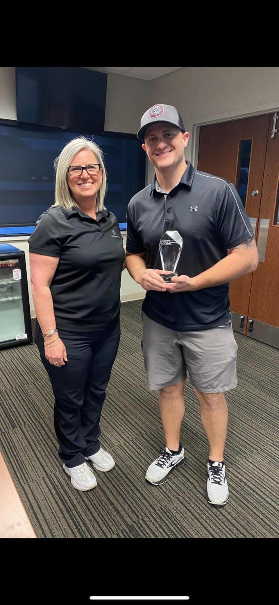 Paramedic Nick Fensom, who has been with the O’Fallon-Shiloh EMS for about five years, was recently awarded the Field Training Officer of the Year. He is shown here with Dawn Elliott, EMS coordinator, at HSHS St. Elizabeth’s Hospital. Fensom instructs paramedic students as a region field training officer, continuing his passion for education, said Kirk Brueggemann, director of public safety. “He is always ready and willing to do whatever it takes, and has the best interests of the students at heart,” Elliott said.