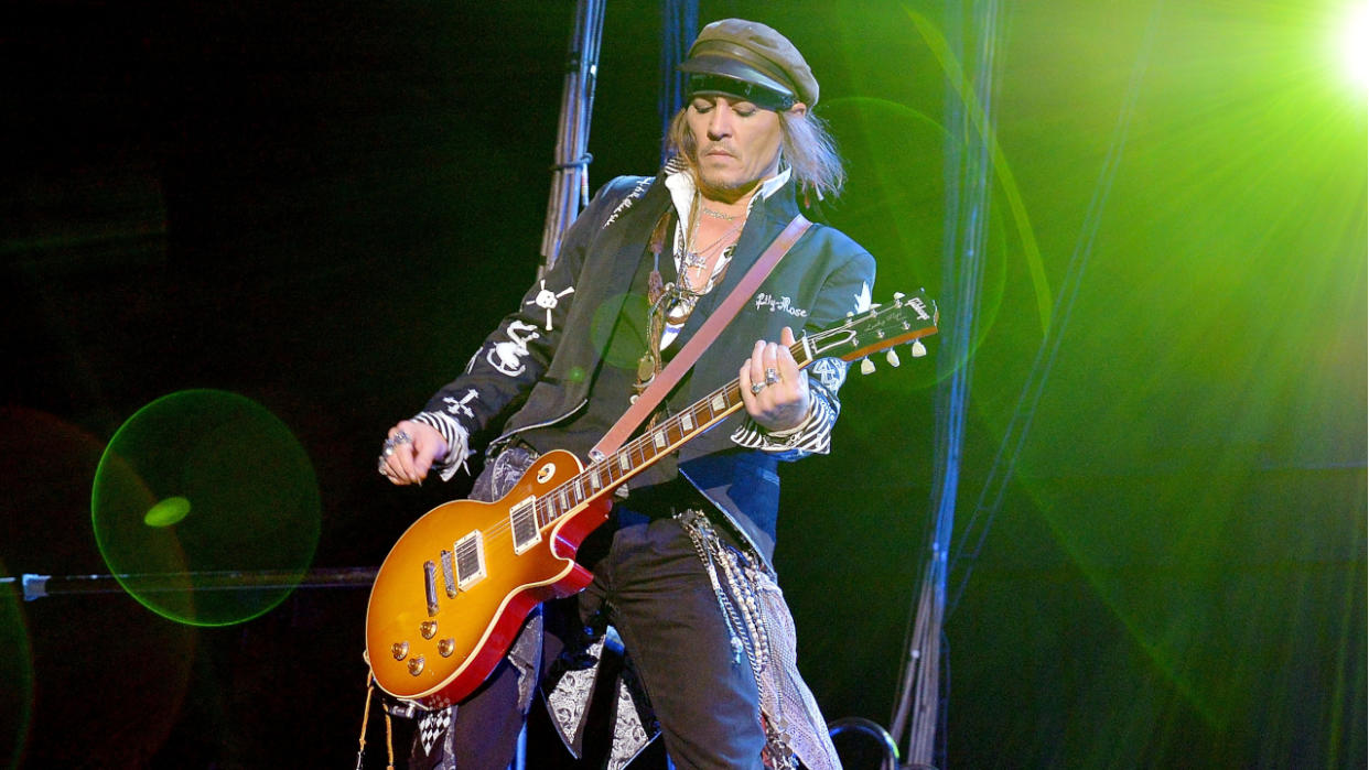  Johnny Depp of Hollywood Vampires performs live on stage at Wembley Arena on June 20, 2018 in London, England. 