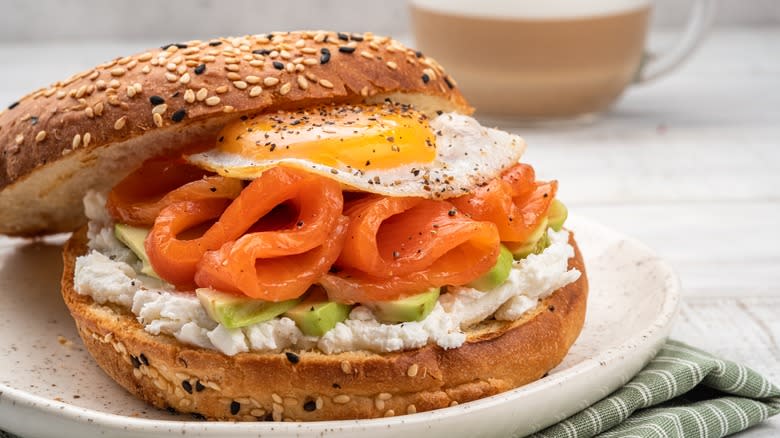 Bagel with lox and fried egg