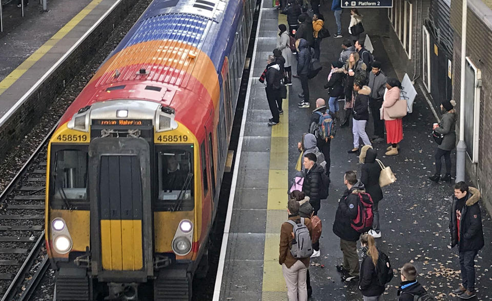Commuters at Bracknell railway station as hundreds of thousands of rail passengers faced travel misery at the start of a series of strikes in the long-running dispute over guards on trains. (Photo by Steve Parsons/PA Images via Getty Images)