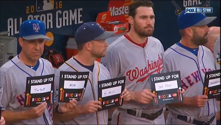 Daniel Murphy holds placard supporting Sandy Alderson at 2016 All-Star game