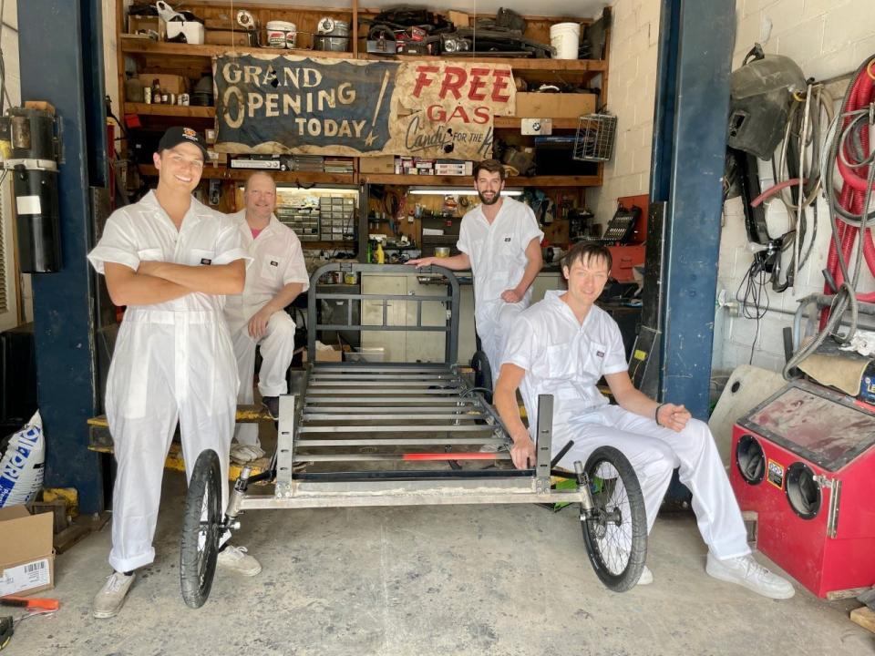 Lebeda Racing team members, from left, Alexander Romeo, Chad Terrell, Michael Fear and Jared Neal with their bed-inspired soapbox car. Not pictured: team member Dante Romeo.