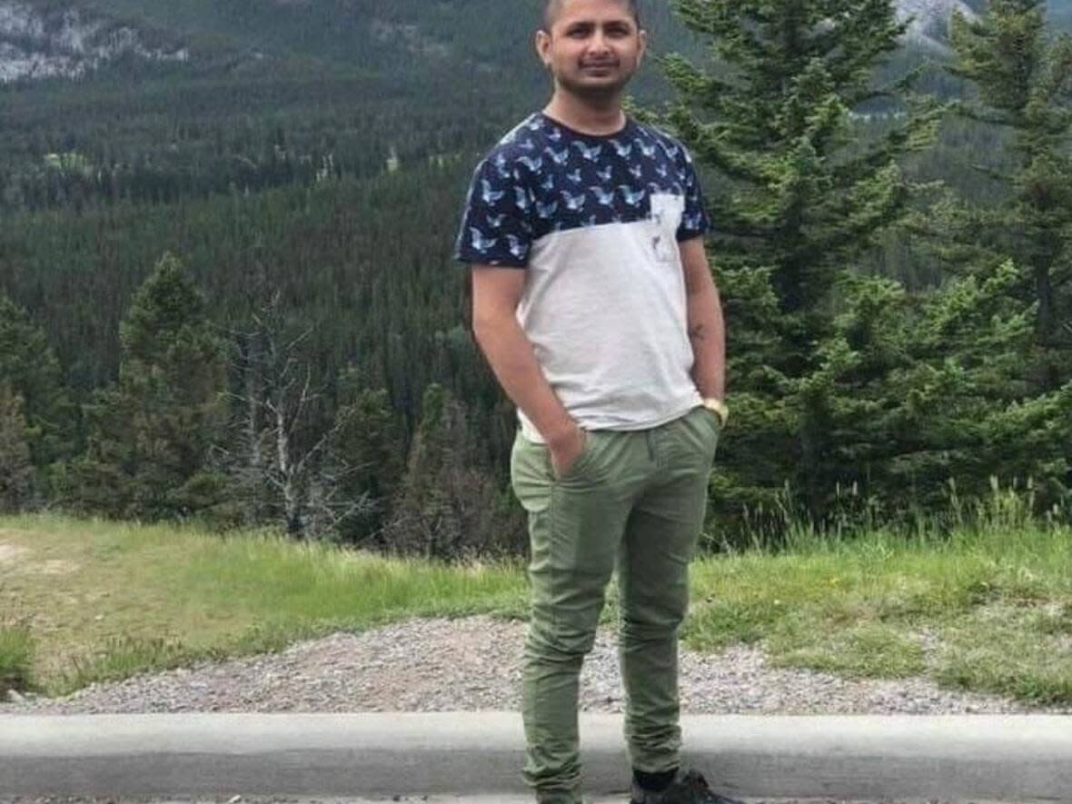 Yogesh Bajgai, 26, is one of two men presumed to have drowned after getting in the water just west of Sandpoint Beach on Thursday, May 23, 2024.  (Submitted by Chuda Bajgai - image credit)