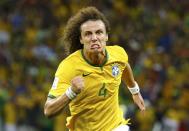 Brazil's David Luiz celebrates after scoring a goal against Colombia during their 2014 World Cup quarter-finals at the Castelao arena in Fortaleza July 4, 2014. REUTERS/Stefano Rellandini