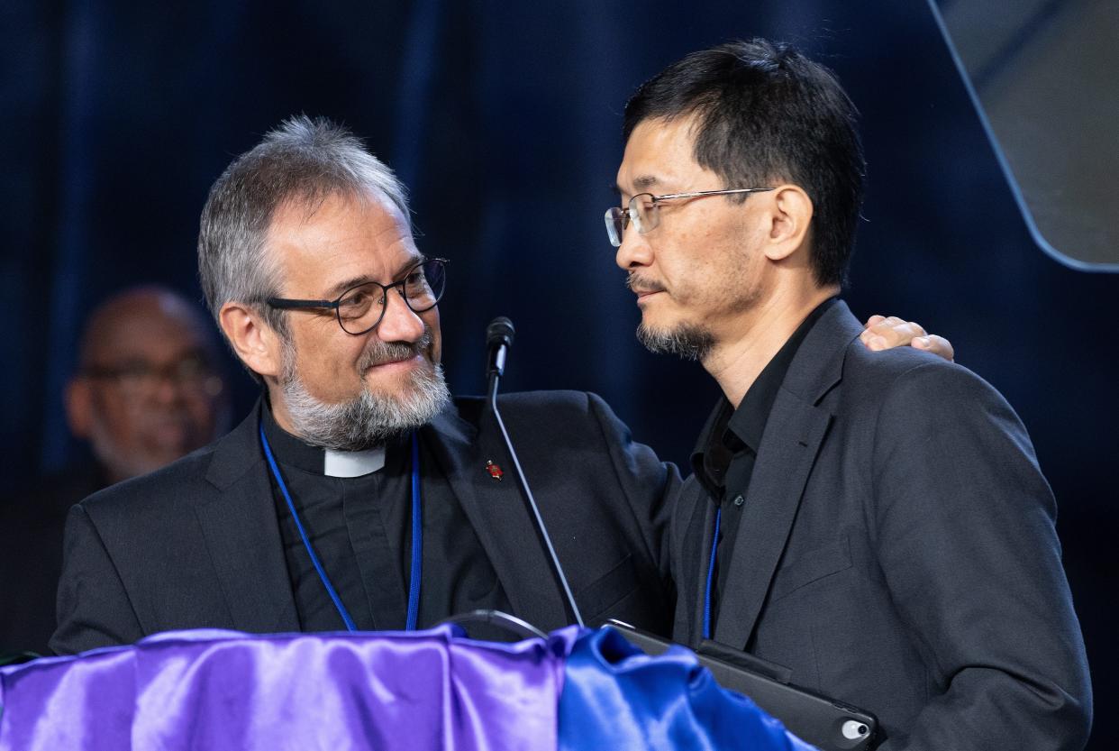 German bishop Rev. Harald Rückert (left) and Russian bishop Rev. Eduard Khegay following a vote on April 25, 2024 at the United Methodist Church General Conference in Charlotte, North Carolina to allow Eurasian churches to leave the denomination.