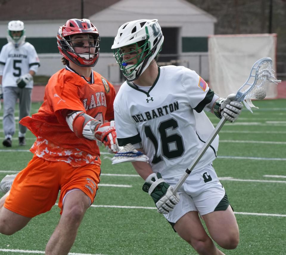 Morristown, NJ -- April 4, 2024 -- Holden Gillespie of Mt. Lakes and Will McGinty of Delbarton as Delbarton edged Mt. Lakes 6-5 in their annual boys lacrosse rivalry game played at Delbarton.