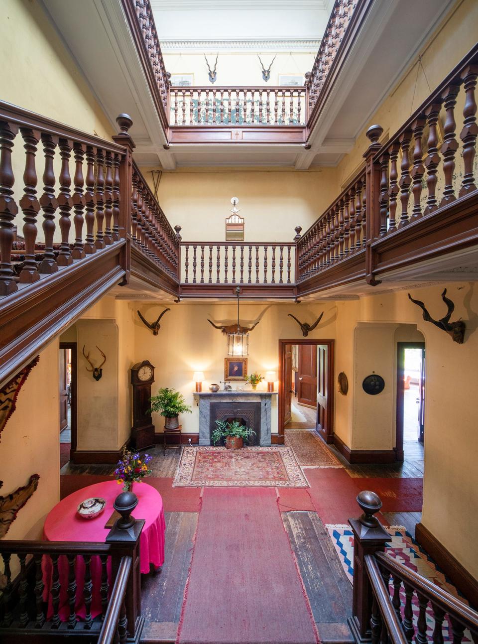 A view of the great hallway and above galleried landings at Kilberry Castle.