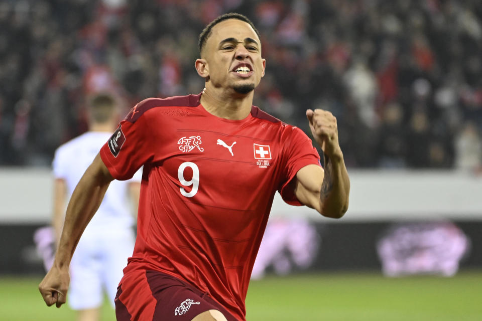 Switzerland's Noah Okafor celebrates scoring during the World Cup 2022 qualifying soccer match between Switzerland and Bulgaria at the Swissporarena stadium in Lucerne, Switzerland, Monday, Nov. 15, 2021. (Alessandro della Valle/Keystone via AP)