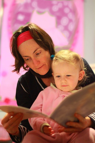 mom reading to child