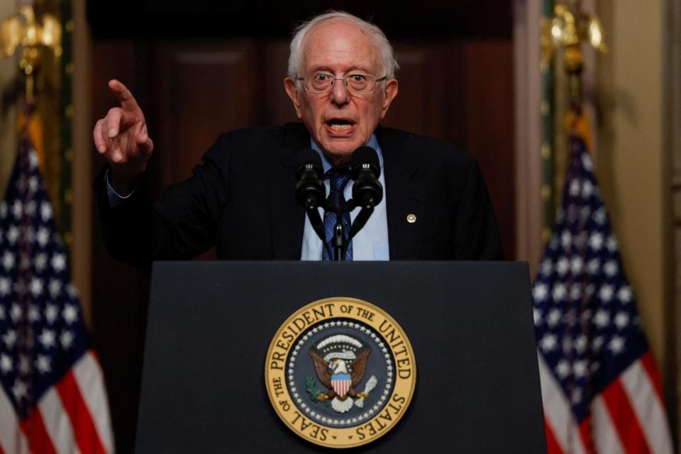 PHOTO: U.S. Senator Bernie Sanders (I-VT) gestures while delivering remarks on lowering healthcare costs, in the Indian Treaty Room of the Eisenhower Executive Office building, at the White House complex in Washington, April, 3, 2024.  (Evelyn Hockstein/Reuters)