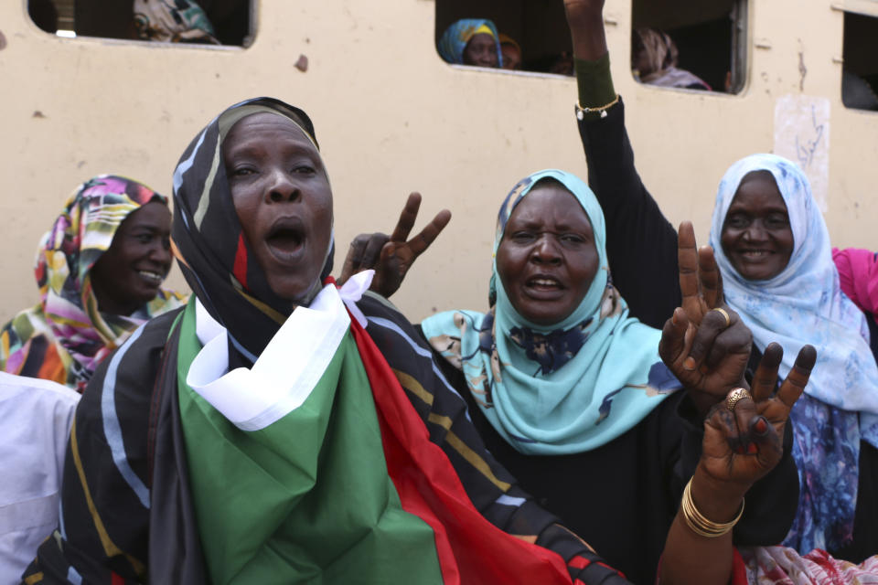 Sudanese pro-democracy supporters celebrate a final power-sharing agreement with the ruling military council Saturday, Aug 17, 2019, in the capital, Khartoum. The deal paves the way for a transition to civilian-led government following the overthrow of President Omar al-Bashir in April. (AP Photo)