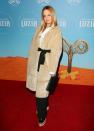 <p>The actress attended the Cirque Du Soleil <em>Luzia</em> red carpet in a teddy coat with a black bow. (Photo: Getty Images) </p>