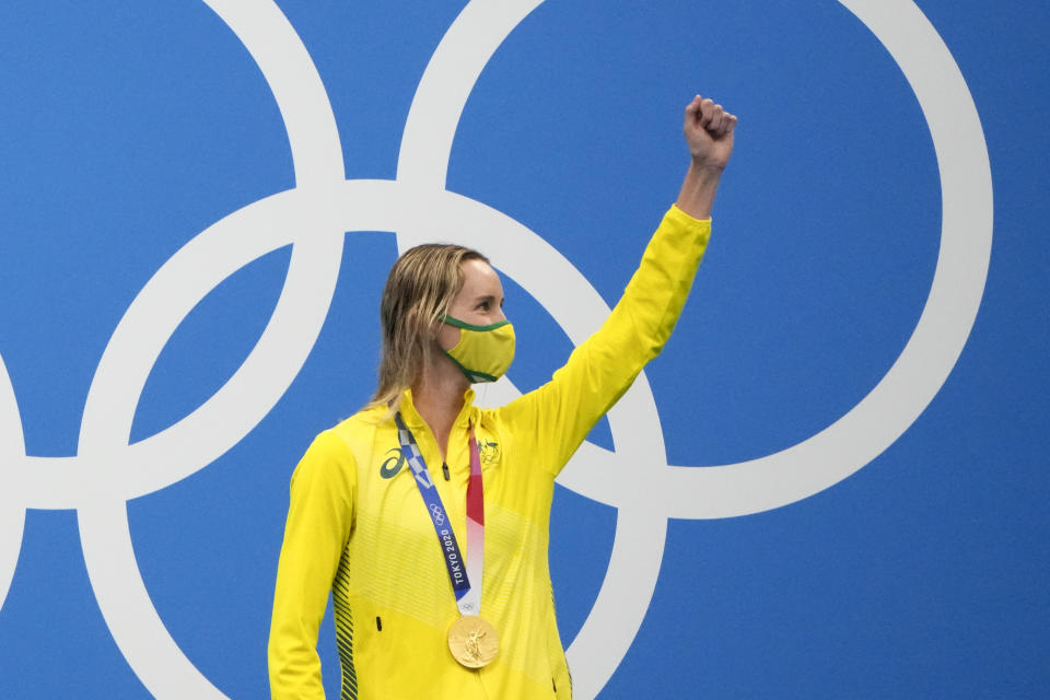 Emma Mckeon, of Australia, celebrates after winning the gold medal in the women's 100-meter freestyle final at the 2020 Summer Olympics, Friday, July 30, 2021, in Tokyo, Japan. (AP Photo/David Goldman)