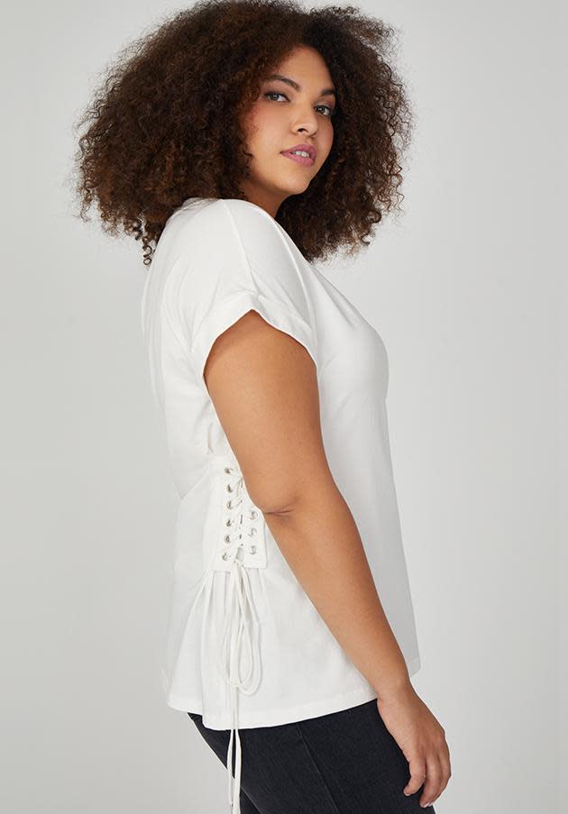 <p>The collection includes clothes that are both modern and cool but will look good on any shape. Like this v-neck corset tee for $69.</p>