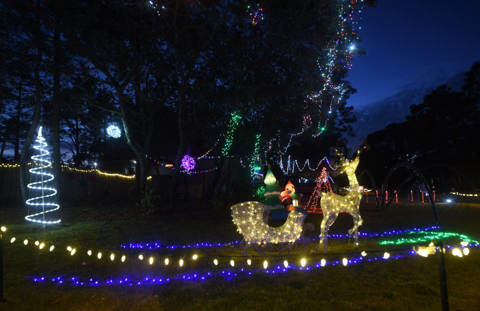 The home at 510 Okeechobee Road is located between River and Carolina Beach roads and has an extensive display that is synced to the music on 89.1.    MATT BORN/STARNEWS