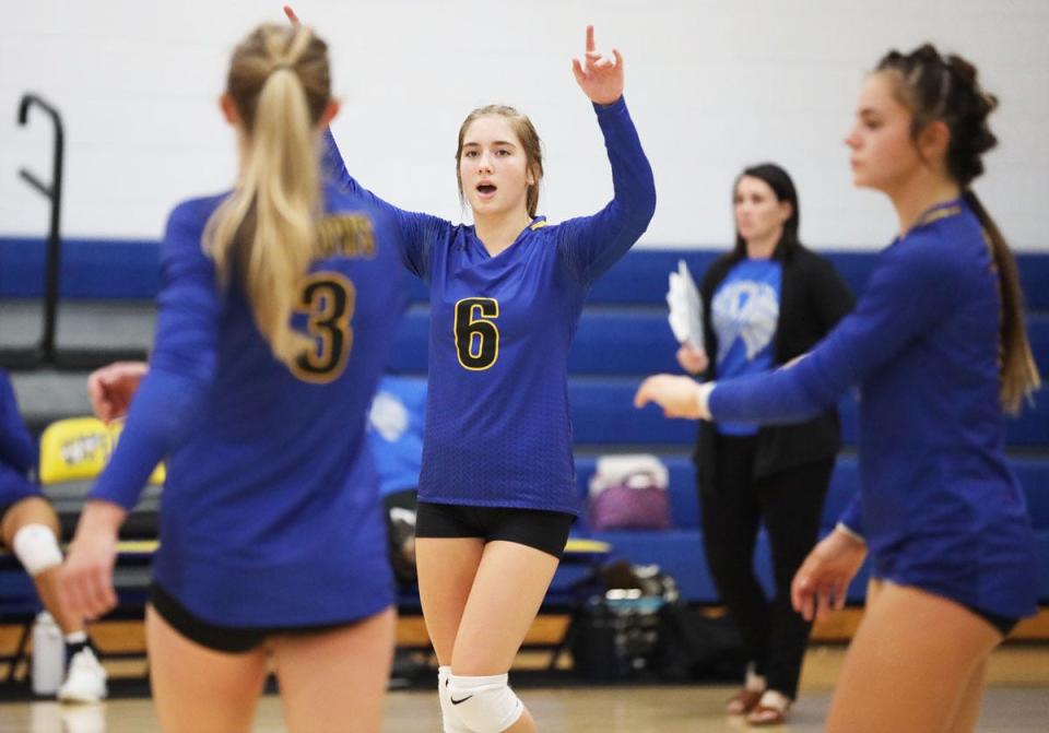 Wapello’s Madelyn Lanz celebrates a Wapello point scored in their win over Lone Tree.