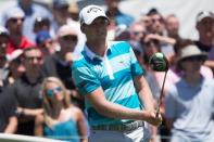 Jun 24, 2017; Cromwell, CT, USA; Daniel Berger plays his shot from the first tee during the third round of the Travelers Championship golf tournament at TPC River Highlands. Bill Streicher-USA TODAY Sports