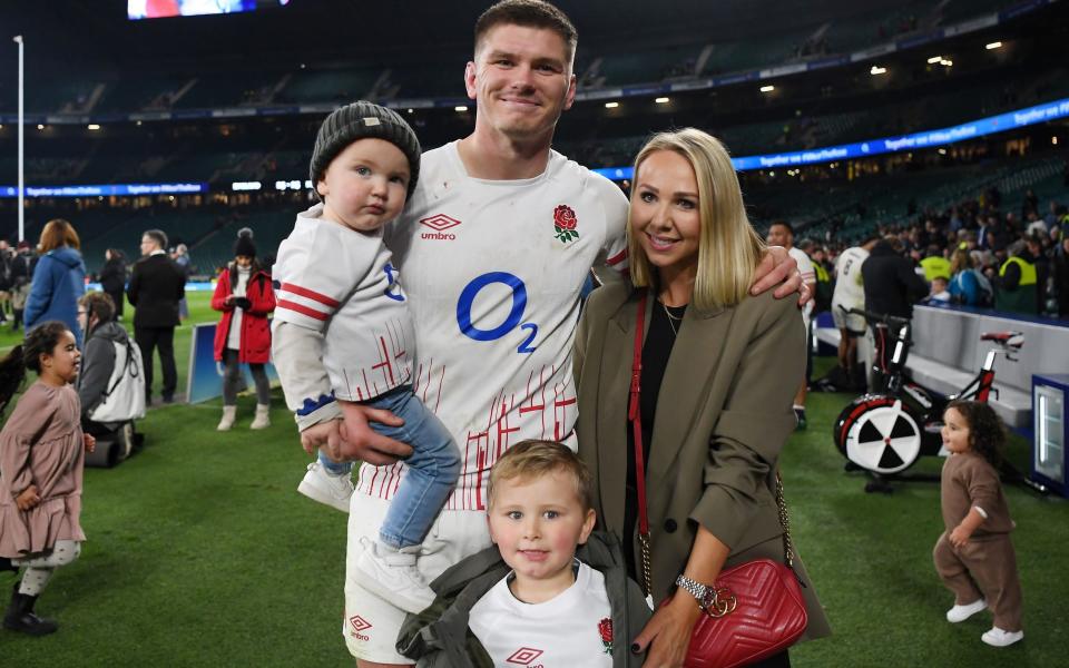 Owen Farrell poses with his family after the 2022 Autumn International match with New Zealand at Twickenham