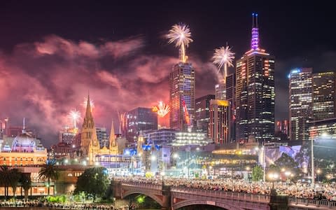 Meanwhile, Melbourne shimmered as the night sky erupted  - Credit: Getty Images AsiaPac