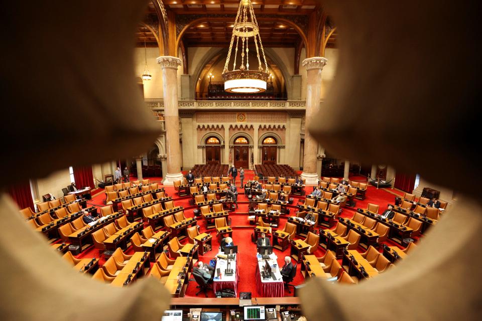 The New York State Legislative Assembly in session in the Assembly Chamber at the New York State Capitol, in Albany, New York, U.S., March 15, 2021. REUTERS/Angus Mordant