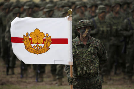 Soldiers of Japanese Ground Self-Defense Force (JGSDF)'s Amphibious Rapid Deployment Brigade, Japan's first marine unit since World War Two, gather before a ceremony activating the brigade at JGSDF's Camp Ainoura in Sasebo, on the southwest island of Kyushu, Japan April 7, 2018. REUTERS/Issei Kato