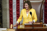 House Speaker Nancy Pelosi of Calif., finishes the vote to approve the Inflation Reduction Act in the House chamber at the Capitol in Washington, Friday, Aug. 12, 2022. A divided Congress gave final approval Friday to Democrats' flagship climate and health care bill. (AP Photo/Patrick Semansky)
