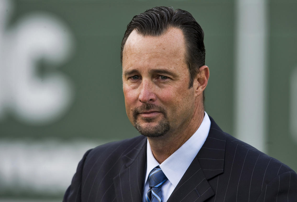 Boston Red Sox pitcher Tim Wakefield announces his retirement during a news conference at the team's new spring training complex in Fort Myers, Florida, February 17, 2012. Wakefield, who carved out a 19-year Major League Baseball pitching career thanks to his utterly unpredictable knuckleball, announced his retirement from the Boston Red Sox on Friday. REUTERS/Steve Nesius  (UNITED STATES - Tags: SPORT BASEBALL)