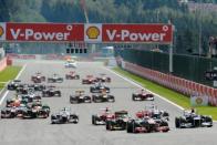 McLaren Mercedes' driver Jenson Button (2nd right) leads at the start of racing at the Spa-Francorchamps circuit. Button in a McLaren led from start to finish to win the Belgian Grand Prix at Spa-Francorchamps