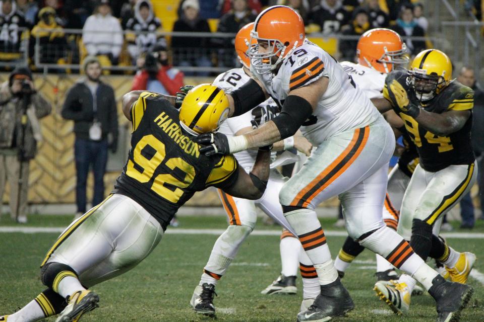 Cleveland Browns offensive lineman Tony Pashos (79) blocks Pittsburgh Steelers James Harrison (92) on Dec. 8, 2011, in Pittsburgh.