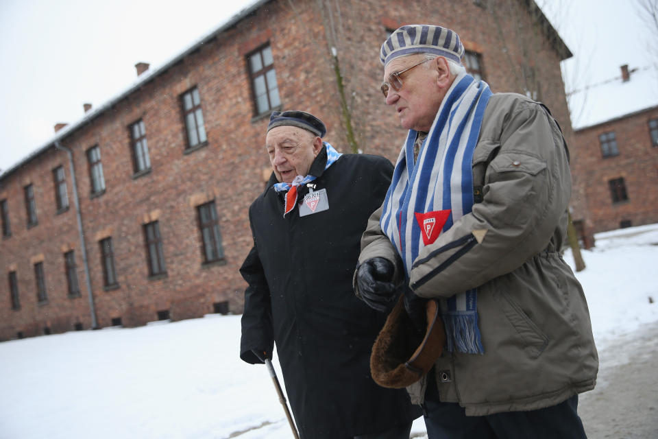 Members of an association of Auschwitz concentration camp survivors depart after laying wreaths at the execution wall at the former Auschwitz I concentration camp on January 27, 2015 in Oswiecim, Poland. International heads of state, dignitaries and over 300 Auschwitz survivors are attending the commemorations for the 70th anniversary of the liberation of Auschwitz by Soviet troops on 27th January, 1945. Auschwitz was among the most notorious of the concentration camps run by the Nazis during WWII and whilst it is impossible to put an exact figure on the death toll it is alleged that over a million people lost their lives in the camp, the majority of whom were Jewish.