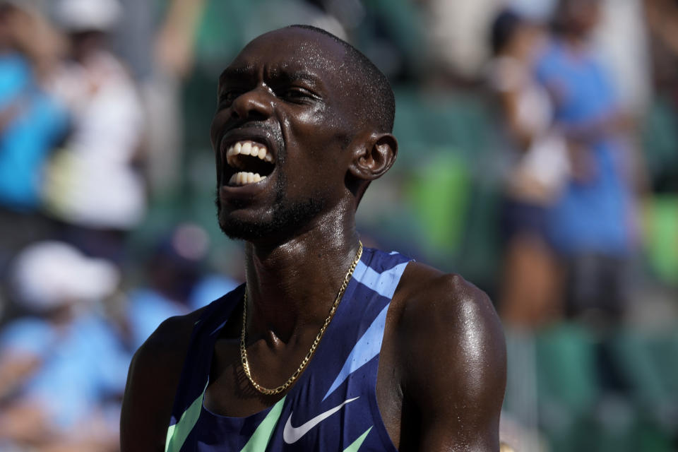 Paul Chelimo celebrates after his win in the finals of men's 5000-meter run at the U.S. Olympic Track and Field Trials Sunday, June 27, 2021, in Eugene, Ore. (AP Photo/Ashley Landis)