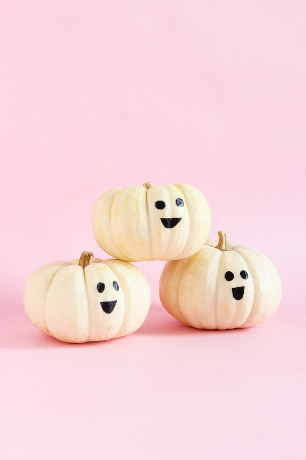 <p>These friendly little ghost pumpkins definitely won't spook any passersby, but they will make anyone who looks at them smile. How could you not?<br><br>Get the tutorial at <a href="https://thecraftedlife.com/10-minutes-or-less-diy-happy-pumpkins/" rel="nofollow noopener" target="_blank" data-ylk="slk:The Crafted Life;elm:context_link;itc:0;sec:content-canvas" class="link ">The Crafted Life</a>.</p>