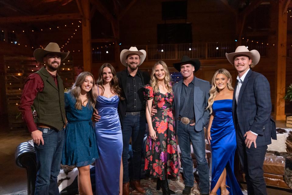 "Farmer Wants a Wife" cast members (from left) farmer Brandon; dater Grace Girard from Caledonia, Wisconsin; dater Sydney; farmer Mitchell; host Jennifer Nettles; farmer Ty; dater Taylor; and farmer Nathan pose for a group shot during the "Reunion" episode of "Farmer Wants a Wife" that aired Thursday, May 16, 2024.