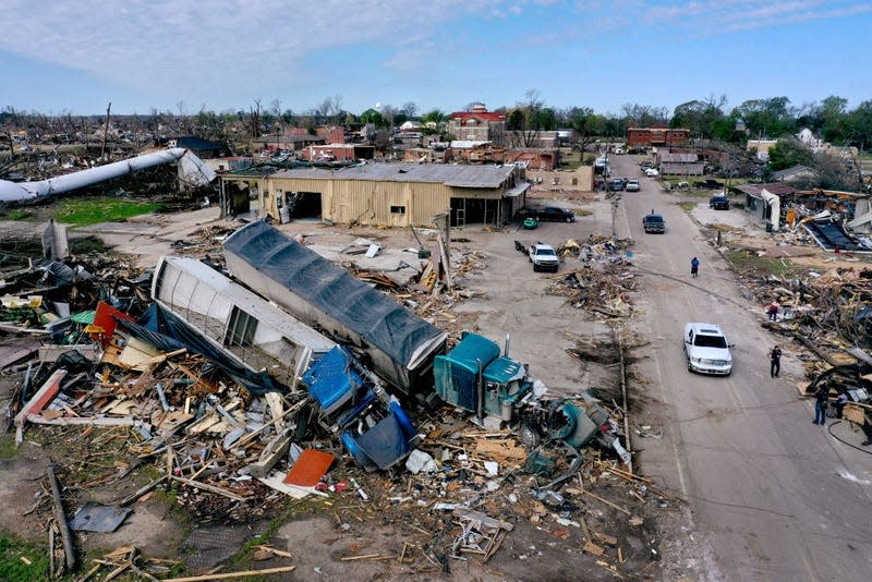 In an aerial view, piles of debris remain where homes once stood before Friday’s EF-4 tornado on March 26, 2023 in Rolling Fork, Mississippi.