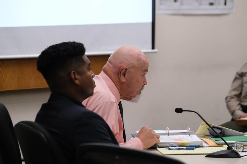 Daniel Saligan Patricio, left, attends his preliminary hearing with his attorney, Ilan Funke-Bilu, at San Luis Obispo Superior Court on Nov. 14, 2023. Saligan Patricio is charged with two counts of vehicular manslaughter for the killings of Jennifer Besser and Matthew Chachere on Nov. 21, 2022.