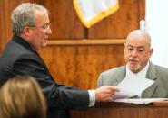Prosecutor Patrick Bomberg (L) questions Christopher Ritchell of AT&T, during the murder trial of former New England Patriots player Aaron Hernandez at the Bristol County Superior Court in Fall River, Massachusetts, March 9, 2015. REUTERS/Aram Boghosian/Pool (UNITED STATES - Tags: CRIME LAW SPORT FOOTBALL)