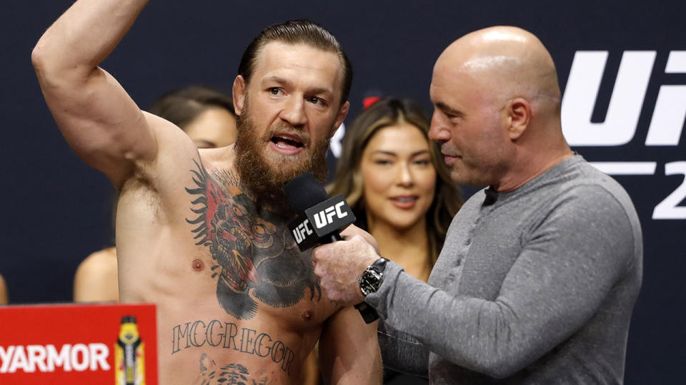 Conor McGregor and Joe Rogan, pictured here at weigh-ins for UFC 246 in January 2020.