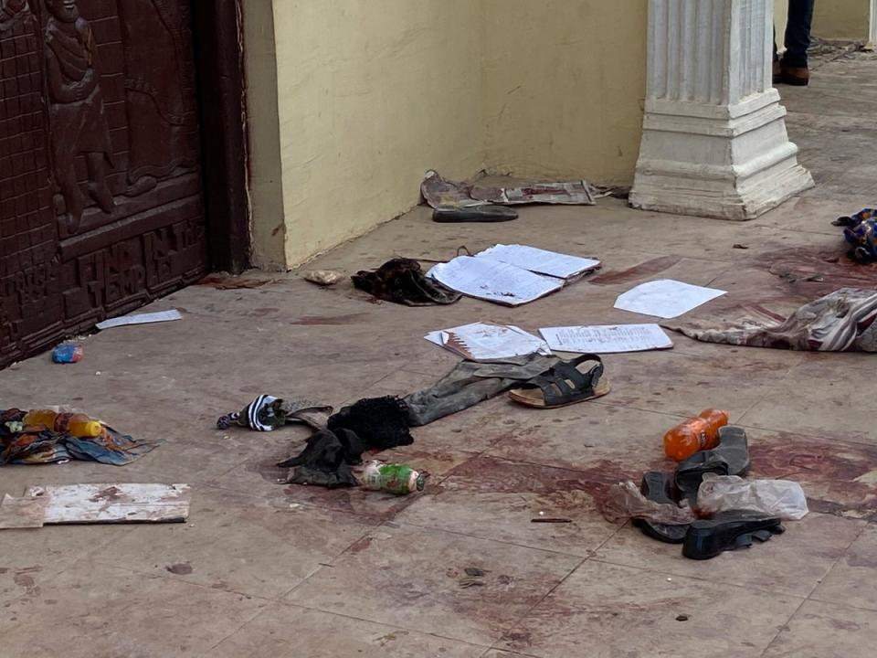 Shoes and personal belongings lie on the blood-soaked floor following the deadly attack (AP)